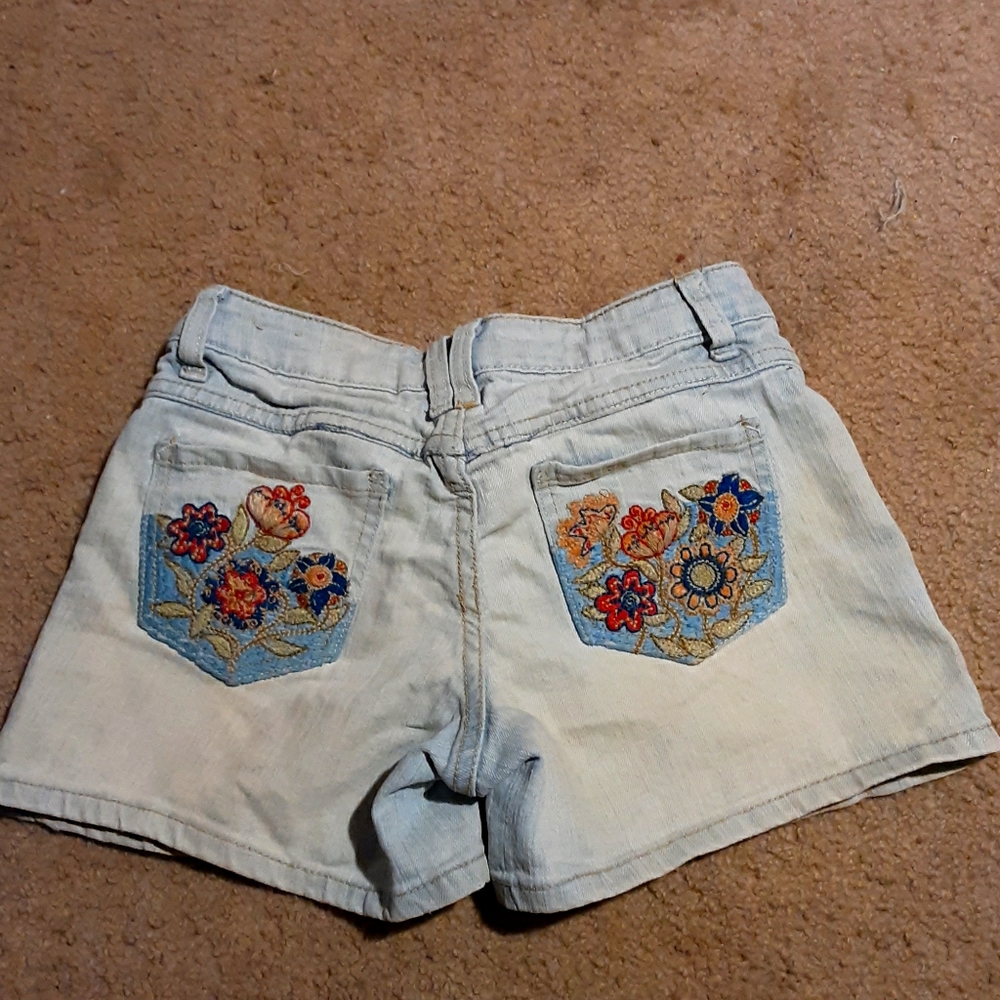 Size 12 Junior jean shorts with embroidery.